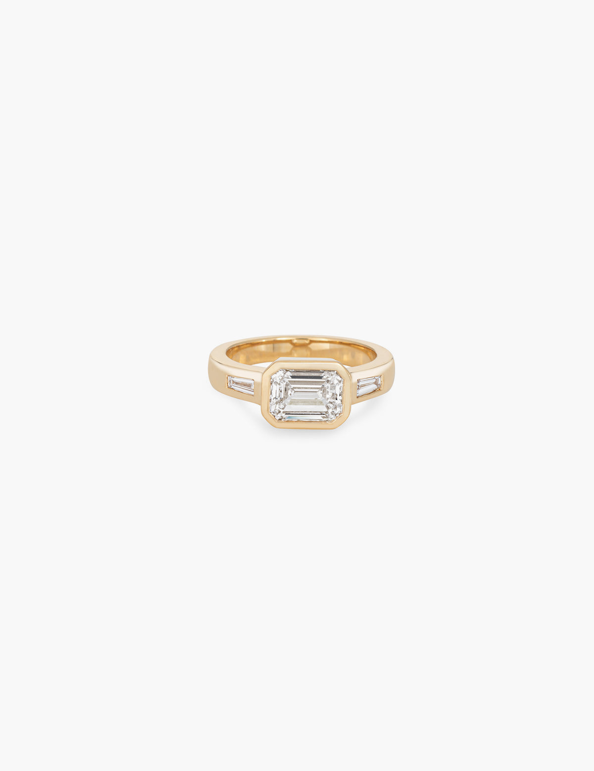 Emerald cut ring with tapered baguettes