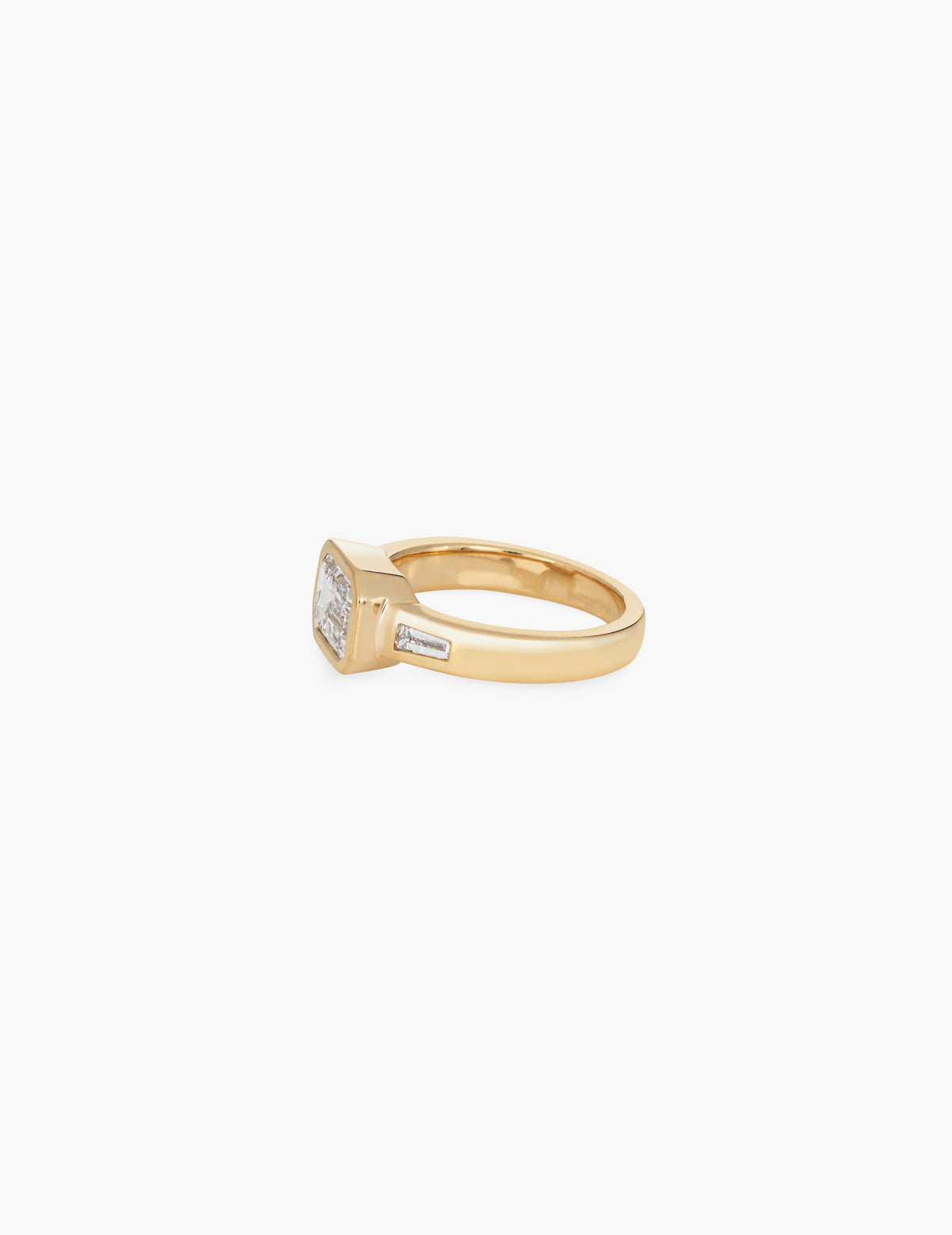 Emerald cut ring with tapered baguettes
